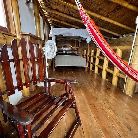 Hostal Monte Libano Пуерто-Лопес Номер фото